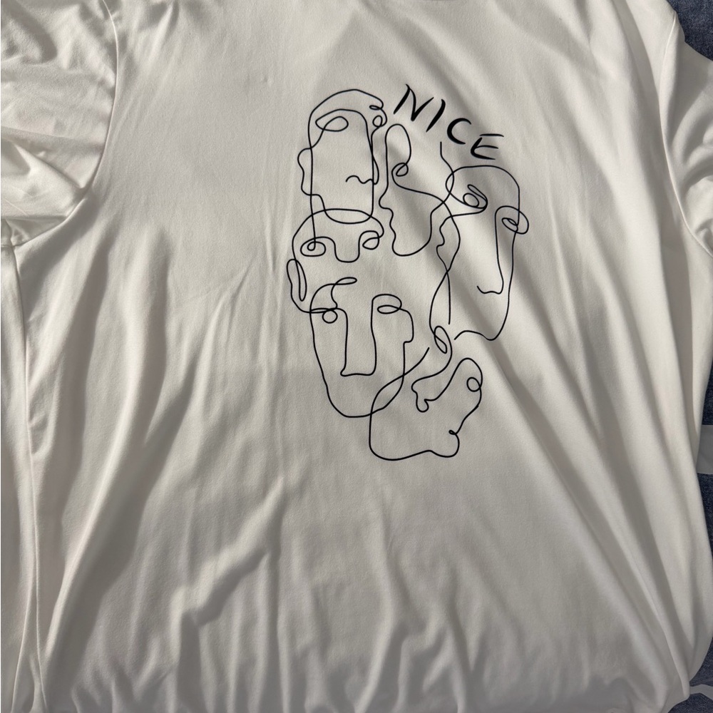 White Graphic Tee with Abstract Faces